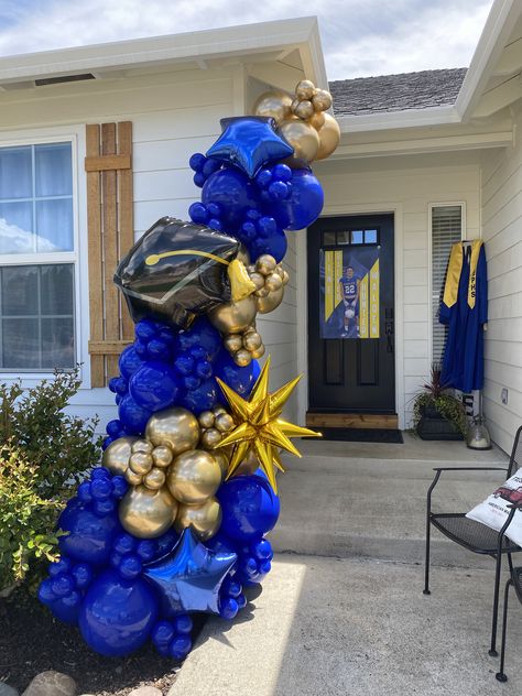 Balloon Garland Blue And Gold, Graduation Party Ideas Decorations Blue And Gold, Royal Blue And Gold Balloon Garland, Front Door Balloon Decor, High School Graduation Balloon Garland, Grad Balloon Garland, High School Reunion Balloon Arch, Balloon Garland Front Door, Graduation Balloon Garland Ideas