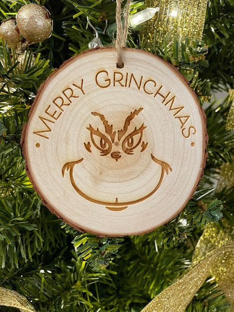 "♥ Our Personalized First Christmas Ornament is laser engraved on a natural wood slice and then tied with twine.  This ornament measures 3.50\" to 4.00\".  Each natural wood slice is unique in shape, markings and color.                                                            ♥ We offer FREE SHIPPING WITHIN THE US ♥  ▻▻ SHIPS IN 3 TO 5 BUSINESS DAYS + SHIPPING TIME ◅◅   We Ship via USPS  ♥ Our wood slice ornaments make great personalized gifts. Give a gift that is sure to be remembered or                                                                                           treat yourself. ♥ We are happy to answer any questions that you may have      Please use Etsy Convo's. Thank you for stopping by! ♥" Dremel Wood Carving Christmas Ornaments, Rustic Wood Ornaments, Woodburned Ornaments Tree Slices, Handmade Wood Ornaments, Wood Burnt Ornaments Diy, Wood Burning Christmas Gifts, Wood Burning Ornaments Tree Slices, Woodburned Christmas Ornament, Wood Burning Ideas Christmas