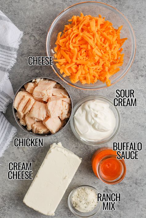 Homemade buffalo chicken dip is quick and easy to make! It is a rich and creamy dip made with ingredients like cream cheese, sour cream, and buffalo sauce for an extra kick! #spendwithpennies #buffalochickendip #appetizer #snack Dutch Oven Buffalo Chicken Dip, Buggalo Chicken Dip Oven, Easy Buffalo Chicken Dip Rotisserie, Franks Buffalo Chicken Dip Oven, Fast Buffalo Chicken Dip, Buffalo Chicken Dip With Ranch Seasoning, Buffalo Chicken Dip Cast Iron Skillet, Buffalo Chicken Dip Ideas, Layered Buffalo Chicken Dip Oven