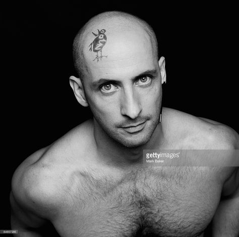 Richard Fairbrass of Right Said Fred during a shoot to promote an EP of Right Said Fred songs covered by Heavenly Records artists, 1992. The logo on his head is that of Heavenly Records. Right Said Fred, Neo Soul, Pierre Cardin, Portrait Tattoo, Getty Images, High Resolution, Resolution, Songs, Music