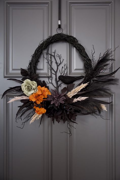 PRICES MAY VARY. Unique Design: This oval Halloween wreath is a standout decoration for your front door and porch, creating a perfect blend of elegance and spookiness for the Halloween Holiday Handcrafted with Care: Each wreath is meticulously handcrafted by experienced wreath makers, ensuring that every piece is unique and of the highest quality Natural Materials: The oval base is handwoven from natural grapevines, painted black and naturally air-dried to enhance the Halloween vibe Large Size: Dark Fall Wreath, Halloween Front Door Wreath, Gothic Wreath Diy, Grapevine Halloween Wreath, Halloween Reefs Front Doors, Halloween Craft Decor, Neutral Fall Wreath, Halloween Wreaths For Front Door Diy, Modern Fall Wreaths For Front Door