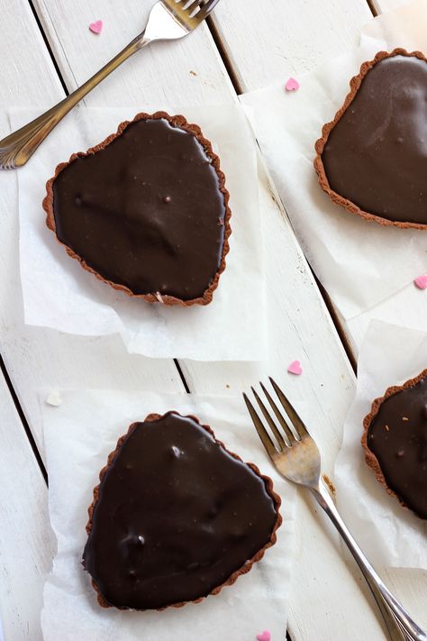 Nothing says 'I love you' on Valentine's Day more than home baked treats. These caramel filled chocolate tarts fit the bill perfectly, especially when made in heart shaped tart tins.