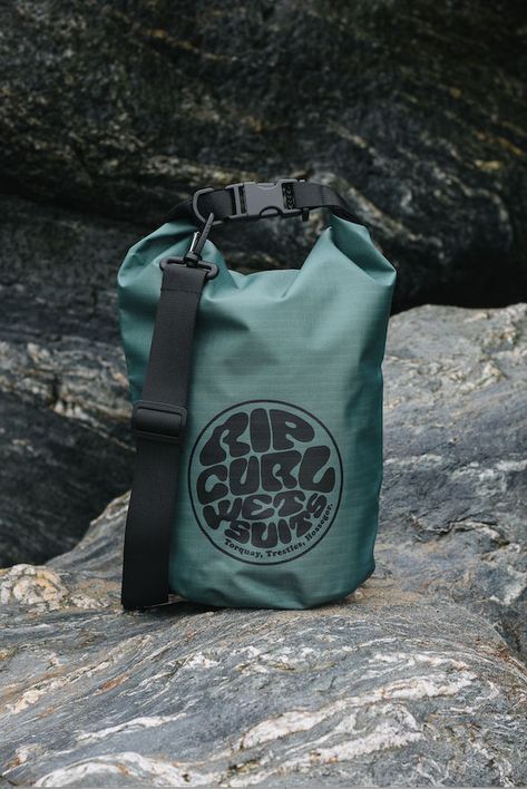 The Surf Series 5L Barrel Bag is more than a bag; it's technical wet and dry equipment for the beach. Surfing Accessories, Surf Bag, Wardrobe Revamp, Lily Ring, Coastal Jewelry, Surf Jewelry, Wet Dry Bag, Surf Brands, Beach Boutique