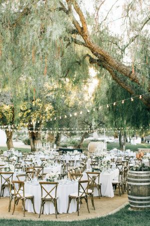 From the ethereal ceremony underneath a 100 year old oak tree, to the floral covered fountains, this wedding wins the award for best reception ever. For starters? The couple rode in on a horse. Oh, an... Rustic Outside Wedding, Outdoor Wedding Reception, Tables And Chairs, Outside Wedding, Wedding Cake Designs, Vineyard Wedding, Oak Tree, Wedding Lights, Wedding Themes