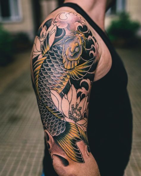 The 75 Best Koi Fish Tattoo Designs for Men | Improb Black Koi Fish Tattoo Design Men, Asian Fish Tattoo, Mens Koi Fish Tattoo, Japanese Koi Fish Tattoo Design For Men, Koi Fish Tattoo Japanese Style, Black Koi Fish Tattoo Design, Koi Fish Tattoo For Men, Koi Fish Arm Tattoo, Koi Fish Tattoo Black