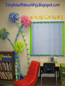 Tangled with Teaching: Dr. Seuss Classroom Theme Day 3 Truffula Trees & Cat in the Hat Shelf Doctor Suess Classroom, Dr Seuss Classroom Theme, Lorax Trees, Dr Seuss Classroom, Seuss Classroom, Seuss Party, Theme Days, Themes Photo, Dr Suess