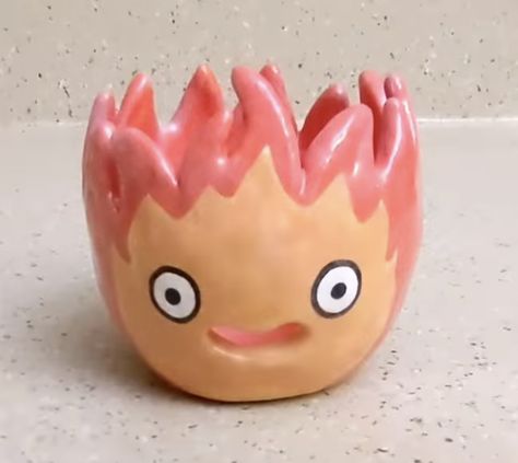 ceramic Howls moving castle calcifer egg yolk seperator Howls Moving Castle Ceramic, Howls Moving Castle Pottery, Howls Moving Castle Calcifer, Howl's Moving Castle Calcifer, Fire Drawing, Howls Moving, The Font, Ceramics Ideas, Pinch Pots