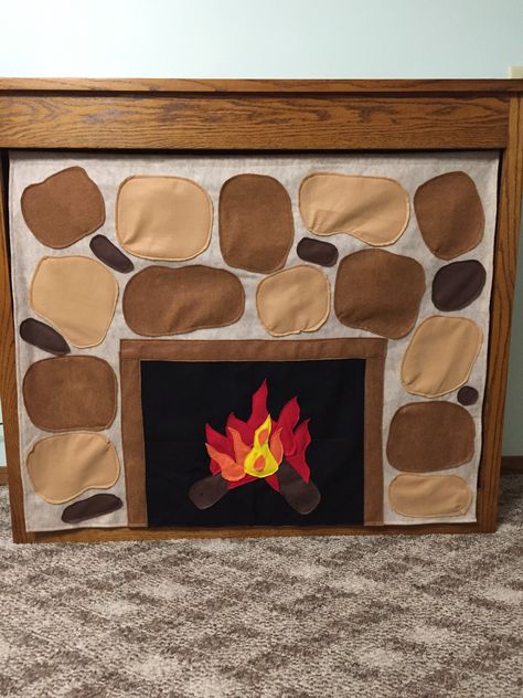 Felt "fireplace" covering a bookshelf. Now we have a mantle to hang our Christmas stockings on this year. Felt Fireplace, Fireplace Furniture Layout, Faux Mantle, Wood Mantle Fireplace, Fireplace Drawing, Country Fireplace, Fireplace Seating, Fireplace Pictures, Slate Fireplace