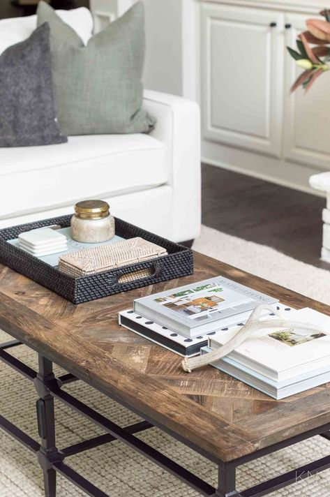 Minimal Coffee Table & Other Tips Rectangle Coffee Table Decor, Minimalistic Living Room, Minimal Coffee, Minimal Coffee Table, Charcoal Pillow, Black Leather Armchair, Rectangle Coffee Table, Large Wood Wall Art, Jute Round Rug