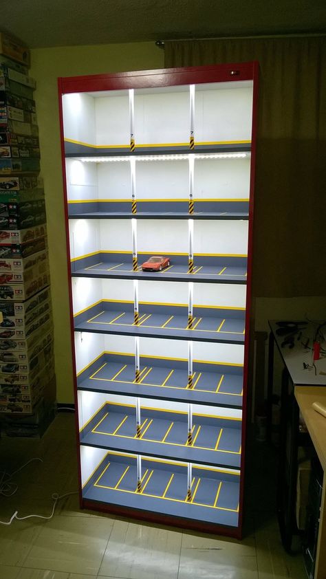 Creative model car display cabinet looks like lighted parking garage. Diecast Cars Display, Hot Wheels Storage, Art Deco Ideas, Hot Wheels Display, Model Cars Collection, Diy Display, Hobby Room, Beyond Words, Car Storage