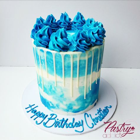 White buttercream base with blue watercolor pattern and blue buttercream dollops on top. Call or email us today to design your dream cake! #boybirthdaycakes #boybirthdayparties #birthdayideas #watercolorcake #birthdaycakeforhim #birthdaycakes #birthdaypartyideas Dollops On Top Of Cake, Blue And White Buttercream Cake, Blue And White Cake For Men, Watercolor Birthday Cake, Cake Designs For Boy, 15th Birthday Cakes, Blue Birthday Cakes, Buttercream Cake Designs, White Buttercream