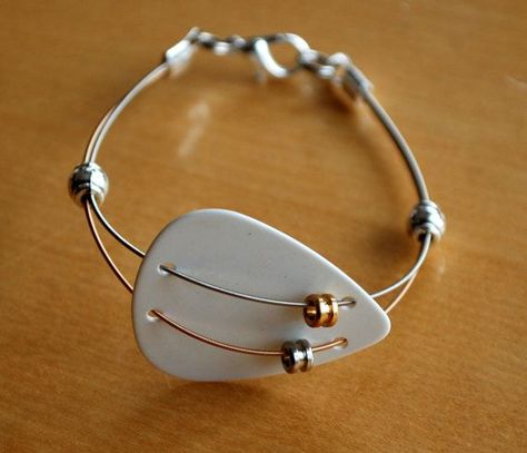 1000+ ideas about Guitar String Jewelry on Pinterest | String ... Guitar Jewelry, Guitar String Jewelry, Guitar String Bracelet, Guitar Pick Jewelry, Bijoux Fil Aluminium, Music Jewelry, Guitar Strings, Maroon 5, Guitar Picks