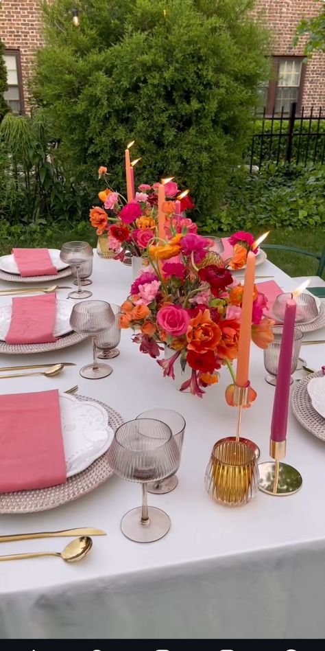 Pink And Orange Floral Centerpieces, Pink Orange Table Setting, Pink And Orange Party Ideas, Pink And Orange Wedding Theme Color Schemes, Pink And Orange Dinner Party, Pink Orange Tablescape, Pink And Orange Tablescape, Orange And Pink Table Decor, Pink And Orange Table Setting