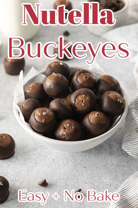 Nutella Buckeyes - A fun spin on classic buckeyes! Made with both nutella and peanut butter before being dipped in chocolate, these no bake balls are a great dessert for parties! Buckeye Recipe | Buckeyes | Nutella Recipes | Nutella Buckeyes Recipe #dessert #nutella No Bake Balls, Nutella And Peanut Butter, Recipes Nutella, Buckeye Recipe, Dessert Nutella, Buckeye Balls, Buckeyes Recipe, Peanut Butter Nutella, Homemade Nutella