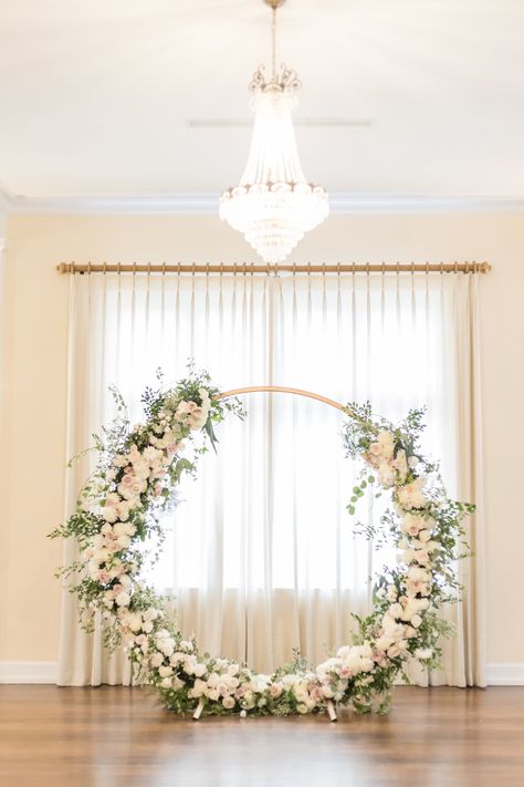 Classic and timeless lush white, blush pink roses floral arrangement on circular arch, eucalyptus and greenery | Tampa Bay wedding planner and designer Elegant Affairs by Design | Kate Ryan Event Rentals Timeless Wedding Arch, Circular Floral Arch Wedding, Round Floral Backdrop, Simplistic Wedding Decor, Circular Arch, Simplistic Wedding, Ceremony Arches, Southern Charm Wedding, White Wedding Arch