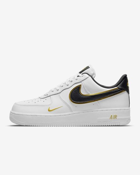 DA8481-100 · White/Metallic Gold/White/Black · It's got crisp leather and a little something extra to show you're on top. The Swoosh is outlined with gold trim, the heel and tongue use gold metallic accents, and other premium details are highlighted gold. Nike Air Force 1 07, Boot Socks, Nike Cortez Sneaker, Shoes Nike, Metallic Accents, Nike Air Force 1, Nike Air Force Sneaker, Air Force 1, Metallic Gold