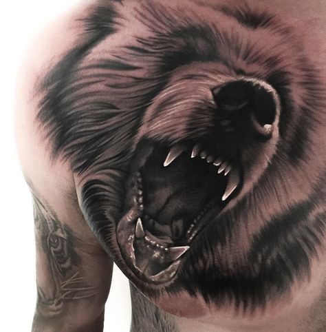 Fun bear roaring on guy's chest. Love the teeth and detail of this piece. Created by Levi Barnett, a tattoo artist based in Melbourne, Australia. Geisha Tattoos, Bear Tattoo Designs, Angry Bear, Tattoo Trend, Tattoo Magazine, Bear Tattoos, Chest Tattoo Men, Bear Tattoo, Tattoo Stencil Outline