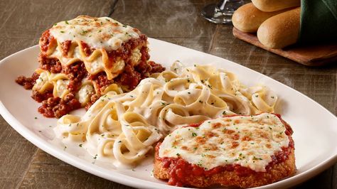 The Best Olive Garden Dishes To Order Again And Again - Chowhound Tour Of Italy Olive Garden Recipe, Olive Garden Recipe, Olive Garden Pasta, Tour Of Italy, Olive Garden Recipes, Classic Lasagna, Italy Tours, Better Homes And Garden, Olive Gardens