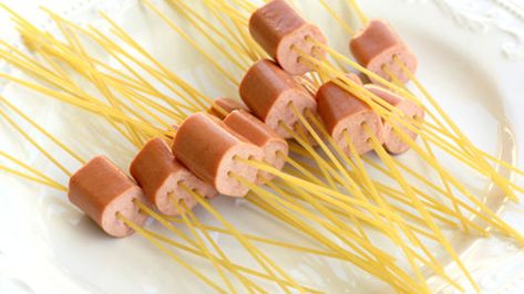 Spider Dogs Recipe - Tablespoon.com Spider Dogs, Hot Dog Bites, Hot Dog Spaghetti, Daycare Meals, Finger Foods For Kids, Hot Dog Recipes, Summer Snacks, Kids Ideas, Fun Kids Food