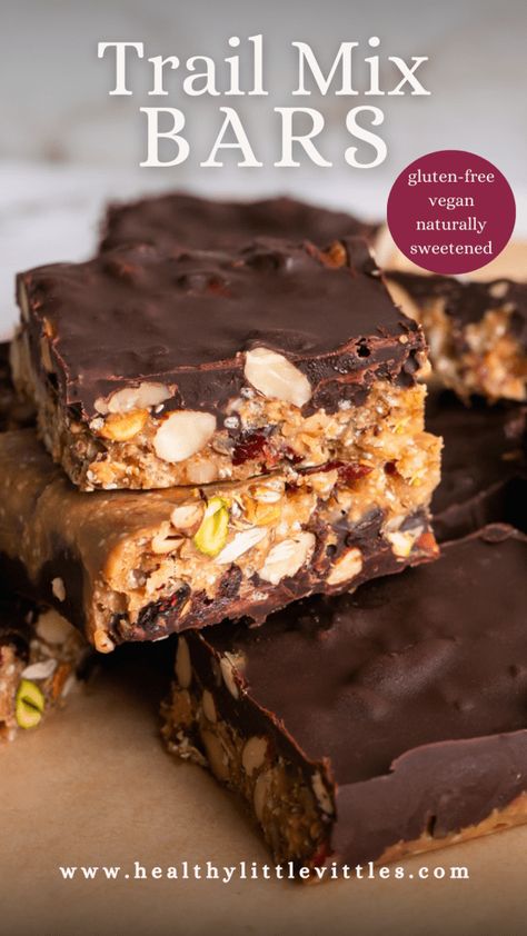 These deliciously crunchy, salty-sweet Trail Mix Bars make the best healthy snack! They are made with a variety of nuts and seeds, dried cranberries, and crispy quinoa mixed with natural peanut butter, coconut oil, maple syrup, and vanilla and then topped with a layer of melted chocolate. These naturally sweetened bars are gluten-free, vegan! Home Made Kids Snacks, Homemade Salty Snacks, Nut Free Trail Mix, Sweet Trail Mix, Trail Mix Bars, Nut Free Snacks, Healthy Trail Mix, Crispy Quinoa, Healthy Bars