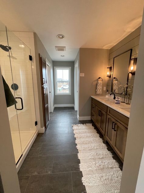 Master Bath Ideas Brown Cabinets, Master Bathrooms Western, Rectangle Bathroom Layout Floor Plans, Dark Tile Floor Bathroom Wood Vanity, Bathroom Dark Brown Floor, Brown Floor Bathroom Ideas, Master Bath Ideas Dark, Bathroom Ideas With Dark Floors, Large Bathroom Design Layout