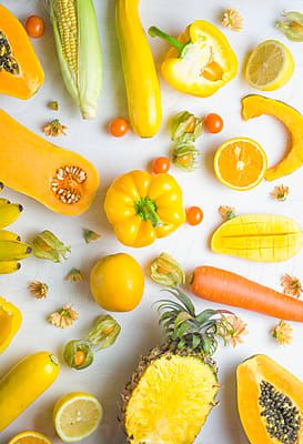 Yellow Fruits And Vegetables On Dark Blue | Stocksy United Yellow Vegetables, Yellow Food, Vegetables Photography, Yellow Fruit, Yellow Foods, Fruit Photography, Food Backgrounds, Eat The Rainbow, Food Photography Styling