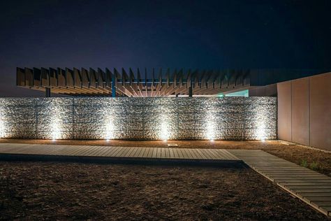 Gabion wall with lights Gabion Lighting, Gabion Wall With Lights, Gabion House Architecture, Wall With Lights, Retaining Wall Lighting, Gabion Rock Wall, Stone Baskets Gabion Wall, Gabion Retaining Wall, Gabion Wall