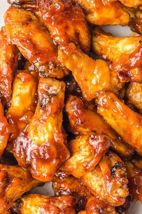 Air fryer BBQ peach bourbon wings make an incredible appetizer. You can serve peach bourbon chicken wings for any occasion. Everyone loves bourbon wings, and the air fryer keeps things quick and easy. So try this air fryer chicken wings recipe, and consider making extra since they always disappear fast! This is one of the best air fryer BBQ chicken recipe ideas. I hope you love these amazing air fryer BBQ peach bourbon wings as much as I do. #airfryer #wings #bbq #peach #bourbon Peach Bourbon Wings, Peach Wings Recipe, Hot Honey Peach Chicken Wings, Peach Bourbon Chicken, Bourbon Wings Recipe, Airfryer Wings, Bourbon Wings, Bourbon Chicken Wings, Maple Wings