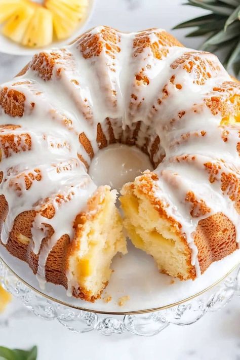 This pineapple pound cake is a light, refreshing treat everyone will love! Topped with a sweet vanilla glaze, it's perfect for any occasion. Pineapple Pound Cake Homemade, Light Desserts Easy, Pineapple Bundt Cake, Pineapple Pound Cake, Pound Cakes Recipes, Bunt Cake Recipe, Classic Pound Cake, Bundt Cake Pans, Roll Cheesecake