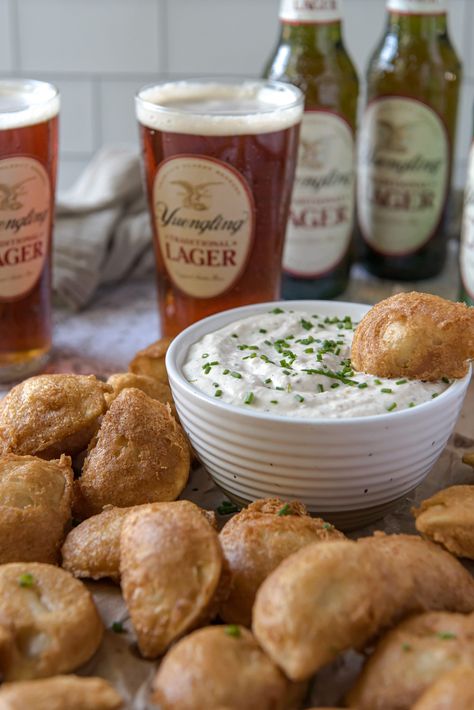 Yuengling Traditional Lager Battered Mini Pierogies Perogies Recipe, Schuylkill County, Creamy Horseradish Sauce, Pierogi Recipe, Whipped Potatoes, Prepared Horseradish, Horseradish Sauce, Cheese Cultures, Flavored Bacon