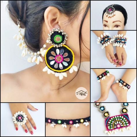 Are you an early bird who's planning to rock this navratri season with her pre-planned traditional look? If yes, checkout this beautiful Multicolored Jewellery Set with black base to match your Garba Vibes for this Navratri Season 🔥 This beautiful ethnic jewellery set is adorned with lots of Cowrie shells and mirrors to give it a traditional Indian look😍 Items included: ❤️ Necklace ❤️ Jhumka with Sahara ❤️ Mang teeka ❤️ 6 Bangles Set ❤️ Ring ❤️ Anklets ❤️ Waist belt This set can b... Garba Jewellery, Indian Look, Bangles Set, Cowrie Shells, Blouse Hand Designs, Bridal Bangles, Dresses Indian, Set Ring, Cowrie Shell