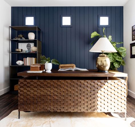 Christina Ackerman Interiors designed this home office with rich wood tones, brass accents and buttery leather. The carved wood detailing on the executive desk is a showstopper with plentry of work space and storage. Wood panelling was added to the back wall and painted in Hale Navy for richness and depth of color. Navy Accent Walls, Wood Panelling, Hale Navy, Carved Table, Wood Detail, Executive Desk, Home Office Space, Brass Accents, Phoenix Arizona