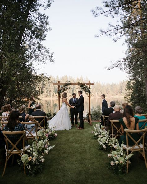 The team at @Fignvine killed it with this dreamy ceremony decor - peep those aisle arrangements! 🌿​​​​​​​​ Photo: @reveriefilms.co​​​​​​​​​​​​​​​​ Rentals: @memorableeventsrentals​​​​​​​​​​​​​​​​ Florals: @fignvine​​​​​​​​​​​​​​​​ Planning: @courtneylawhonevents Small Outdoor Ceremony Set Up, Walkway To Wedding Ceremony, Alters Wedding Outdoor, Wedding Ideas In A Field, Outdoor Covered Wedding Ceremony, Outdoor Elopement Ceremony Decor, Ceremony Outdoor Decor, Spring Outdoor Wedding Ceremony, Lake View Wedding Ceremony