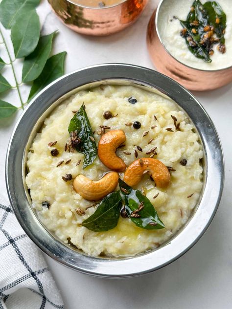 instant pot ven pongal served in a steel bowl garnished with roasted cashews and tempering with coconut chutney and sambar on the side Ven Pongal Recipe, Ven Pongal, Pongal Recipe, Indian Vegetarian Dishes, South Indian Breakfast Recipes, South Indian Breakfast, Recipe Instant Pot, Indian Rice Recipes, Best Pressure Cooker