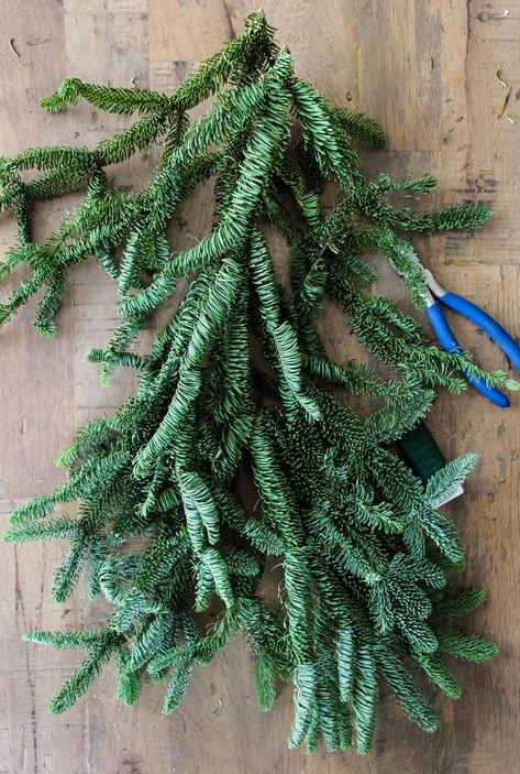 Porch Light Swag Diy Christmas, Natural Christmas Swags, Making A Christmas Swag, Christmas Teardrop Swags Diy, How To Make A Teardrop Swag, Holiday Swags Diy, Diy Door Swag Christmas, How To Make Swag Wreath, How To Make A Door Swag