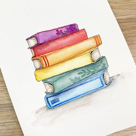 Emma Jane Lefebvre on Instagram: “After lots of requests on how to paint this stack of books, I’ve finally done it! Head on over to my YouTube channel to check it out!” Watercolor Stack Of Books, Books Painting Art, Paintings Of Books, Stack Of Books Drawing, Book Paintings, Books Watercolor, Painted Bookmarks, Emma Jane, Hand Lettering Cards