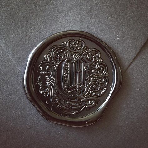 New wax seal. A very ornate C I designed. Black on black. Real not photoshopped. Packaging With Wax Seal, Wax Stamps, Sealing Wax Sticks, Wax Stamp, Wax Seal Stamp, Black On Black, Seal Stamp, Seal Stamps, White Candles