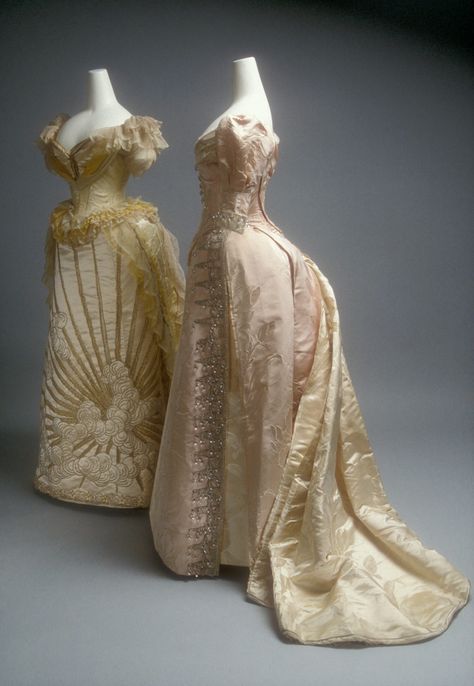 Ball gowns (c 1892) by Jean-Philippe Worth.  Metropolitan Museum of Art. Both of these evening dresses provide examples of the quality of dressmaking for which Charles Frederick Worth and the House of Worth were renowned among society women worldwide by the last quarter of the nineteenth century. Both feature lavish textiles and ornamental embroidery picked out in metallic thread and glass or crystal beads. House Of Worth Gowns, House Of Worth, 1800s Fashion, 19th Century Fashion, Old Dresses, Antique Dress, Vintage Gowns, Antique Clothing, Vestidos Vintage