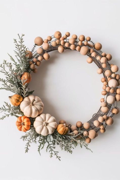 20 Pumpkin Wreath DIY [For Every Occassion] – craftydiyers.com Decor With Wooden Beads, Unique Fall Wreath, Burlap Pumpkin Wreath, Pumpkin Wreath Diy, Fall Decor Wreaths, Burlap Pumpkins, Pumpkin Monogram, Wooden Decorations, Wire Wreath Forms