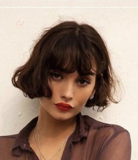 The French bob typically falls at or just above the chin, with a blunt cut that is even all around the head. The hair is typically styled with straight or slightly wavy texture, with minimal layering. Many French bob haircuts are accompanied by bangs, which can be either blunt or side-swept. The French bob can be styled in many different ways, from sleek and polished to tousled and textured. The French bob is a versatile style that can be adapted to suit many different face shapes, from round t Long French Bob With Bangs, French Bob Haircut With Bangs, French Bob Haircut, Haircut Ideas For Women, Taylor Lashae, Bob Haircut Ideas, Hair Magic, Short Dark Hair, French Bob