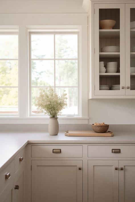 Here's 15 of the most popular greige kitchen cabinet colors to help inspire your kitchen remodel! Best Greige Paint Color Kitchen Cabinets, Kitchen Cabinets Edgecomb Gray, Perfect Greige Sherwin Williams Cabinets, Edgecomb Gray Benjamin Moore Cabinets, Light Gray Cabinets Kitchen, Edgecomb Gray Cabinets, Best Sherwin Williams Paint, Greige Kitchen Cabinets, Best Greige