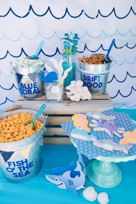 Beach party snack station. Blue coral popcorn. Drift wood pretzels. Galvanized buckets. Boy's Nautical Ocean Birthday Party. #Blue #whale #ocean #nautical #birthdaypartyideas #beach Whale Birthday Parties, Mini Boat, Whale Birthday, Ocean Theme Birthday, Ocean Birthday Party, Nautical Birthday Party, Shark Themed Birthday Party, Birthday Party Snacks, Ocean Birthday