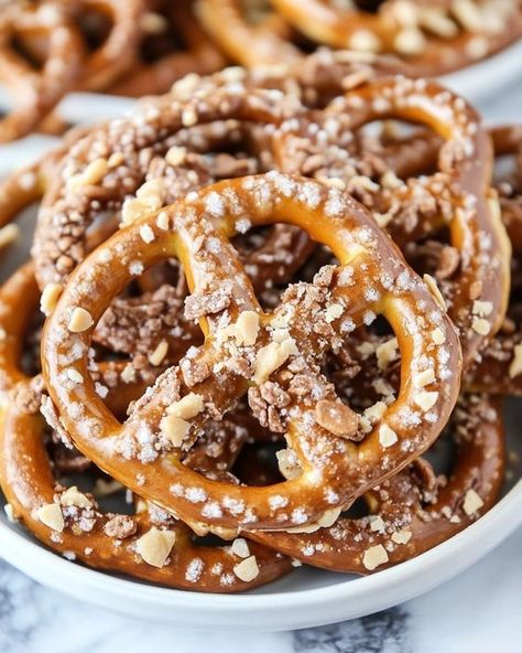 Indulge in the sweet and salty delight of Butter Toffee Pretzels! This easy recipe combines crunchy pretzels with rich toffee and a sprinkle of salt for the perfect snack. Ideal for parties or movie nights, these treats will be a hit. Save this pin and try making them today for a deliciously unique twist on your favorite snack! Candy Pretzels Recipe, Pretzel Snacks For Party, Christmas Salty Treats, Pretzel Flavor Recipes, Heath Toffee Bits Pretzels, Christmas Butter Toffee Pretzels, Coated Pretzel Recipes, Pretzel Sticks Snacks, Toffee Pretzel Recipe