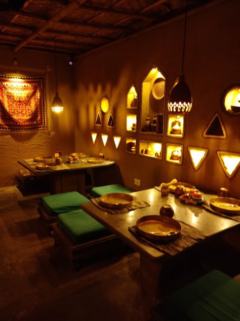 Interior design Rajasthani Cafe Interior, Small Indian Restaurant Design, Desi Cafe Design, Village Style Restaurant Interior, Desi Cafe Interior, Indian Aesthetic Restaurant, Indian Restraunt Interior, Desi Dhaba Design Ideas, Indian Style Restaurant Interior