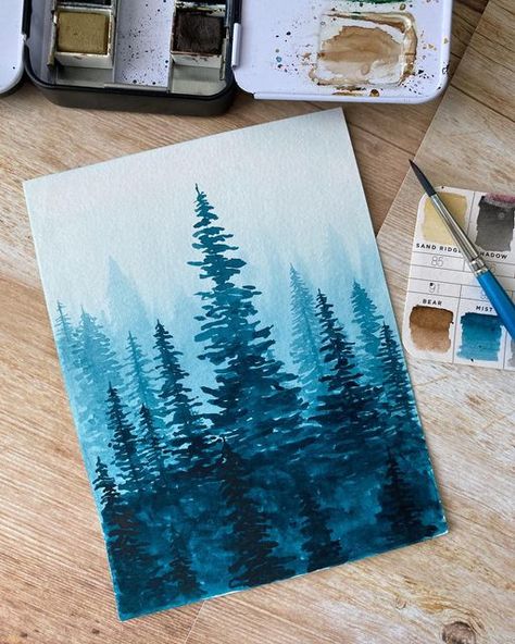 nahlaYSL on Instagram: "i call this piece, “forks, washington” doesn’t it look like it? especially that shade of blue, 😂😂 i also think this is the first time i painted all the way to the edge of the paper. i typically tape down the edges for a clean look. really digging how this looks tho. might paint a few more pieces to the edge like this. #watercolor_daily #watercolor #watercolorpainting #watercolorart #watercolorartist #watercolorist #aquarelle #aquarellepainting #aquarelleart #forks Forks Washington, Shade Of Blue, Shimmer Lights, Blue Forest, Blue Tree, Evergreen Trees, Forest Art, Forest Landscape, Color Stories