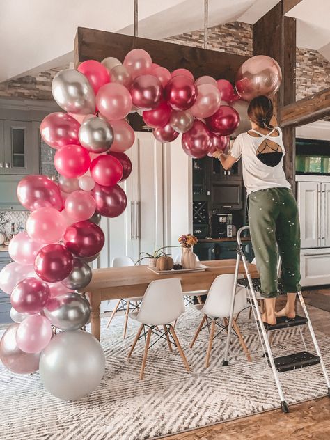 Diy Balloon Photo Backdrop, How Do I Make A Balloon Arch, Balloon Garland Hanging Over Table, Balloon Archway Diy, Creating A Balloon Arch, How Many Balloons Do You Need For A Balloon Arch, Diy Wedding Balloon Arch, Best Way To Hang Balloon Arch, Garage Door Balloon Garland