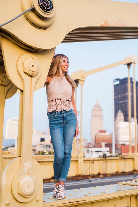 The Clemente Bridge in downtown Pittsburgh is a great spot for senior portraits in the city. You get the rivers, the classic yellow bridge, and the Pittsburgh skyline.  #seniorportraits #pittsburgh #seniorposes #highschoolsenior #pittsburghphotographer #northshore #clementebridge #poses #highschoolpictures  #phipps Pittsburgh Senior Pictures, Pittsburgh Photoshoot, Senior Pictures Places, Senior Pictures Locations, Pictures Downtown, Podcast Ideas, Downtown Sacramento, Urban Senior Pictures, Creative Senior Pictures