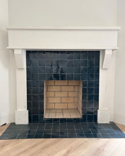 Zellige Tile Studio | Zellige tile #fireplace simple and elegant. . #homerenovation #livingroom #tile | Instagram Fireplace With Accent Tile, Zeolite Tile Fireplace, Fireplace Blue Tile, Plaster And Tile Fireplace, Fireplace Mosaic Tile Ideas, Dark Tile Fireplace Surround, Tile Fireplace With Mantle, Retile Fireplace, Zellige Tile Fireplace