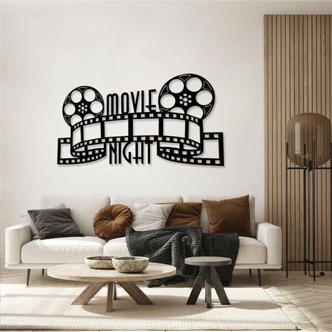 PRICES MAY VARY. Metal Movie Theater Wall Decor: Whether you are a fan of classic black-and-white films or modern blockbusters, this movie reel wall art will add an element of nostalgia and style to your space. Hang it in your living room, home theater, or entertainment room to create a cinematic atmosphere that will impress your guests and liven up your movie nights Reliable Quality: The movie night wall decor is crafted from 0.1"/2mm thick steel, and the most unique waterproof coating design, Movie Decor Ideas, Cinema Living Room, Movie Room Ideas, Home Cinema Room Ideas, Theater Living Room, Movie Theater Theme, Theater Room Decor, Game Room Wall Decor, Cinema Decor