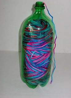 Luksi Creations: How to make a holder for your yarn out of a pop bottle Yarn Holder For Crocheting, Diy Yarn Holder, Crochet Yarn Holder, Crochet Organizer, Yarn Organization, Yarn Holder, Crochet Hack, Yarn Storage, Yarn Diy